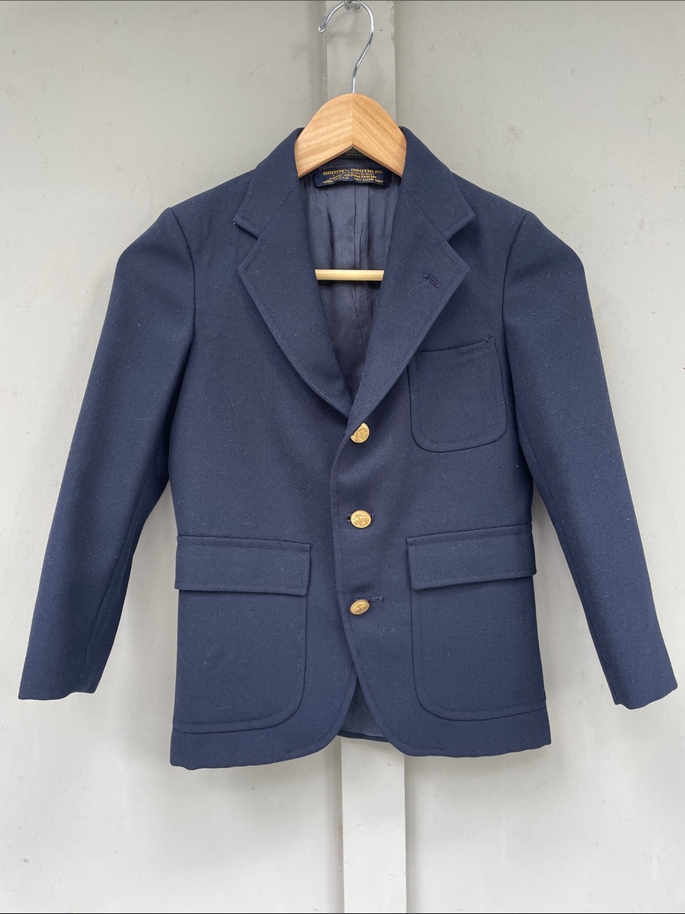 Vintage Brooks Brothers Navy Blue Boy’s blazer/ original buttons. 1960–1980. 10R
